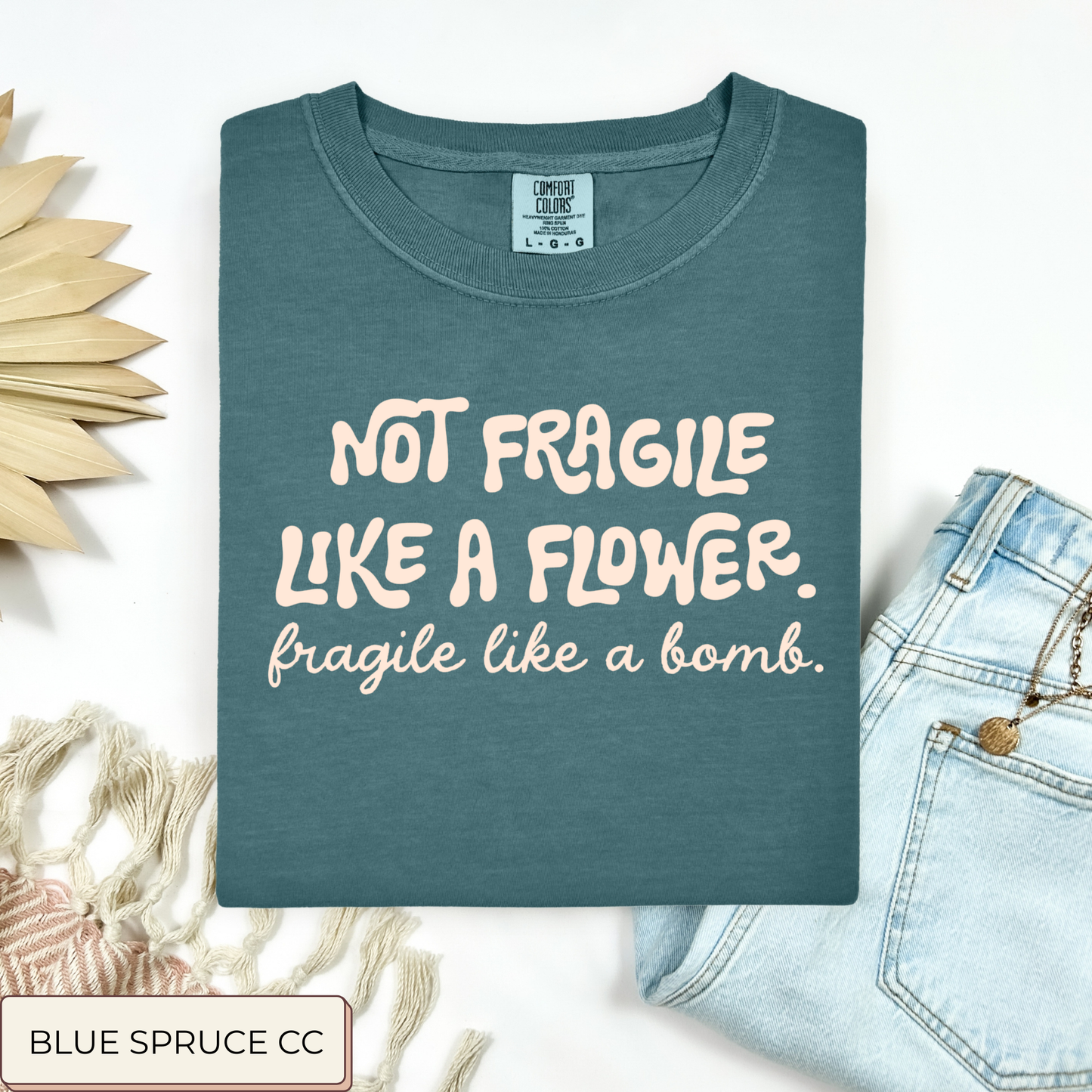 Not Fragile Like A Flower Tee.